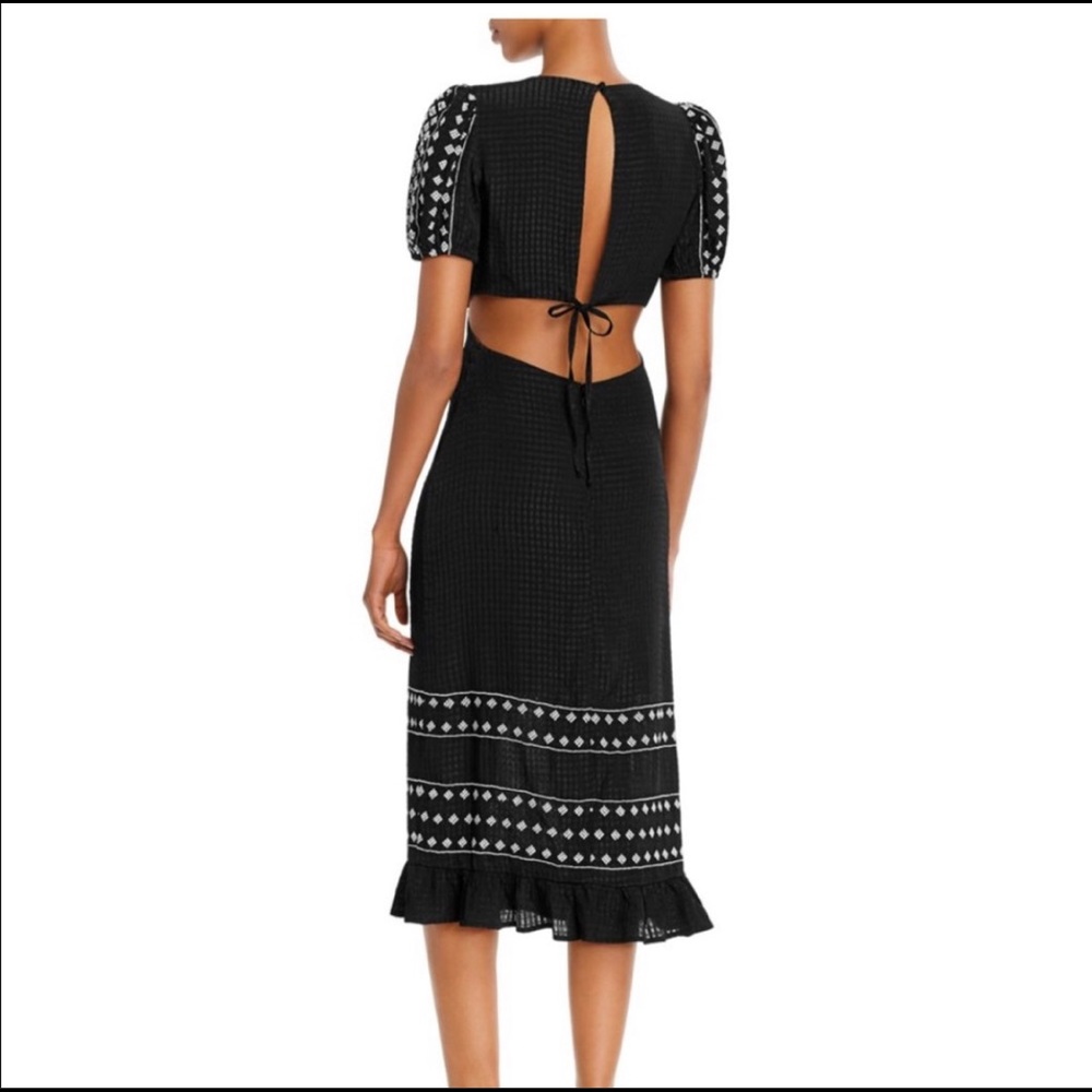 Rahi
Riley Embroidered Open-Back Maxi Dress